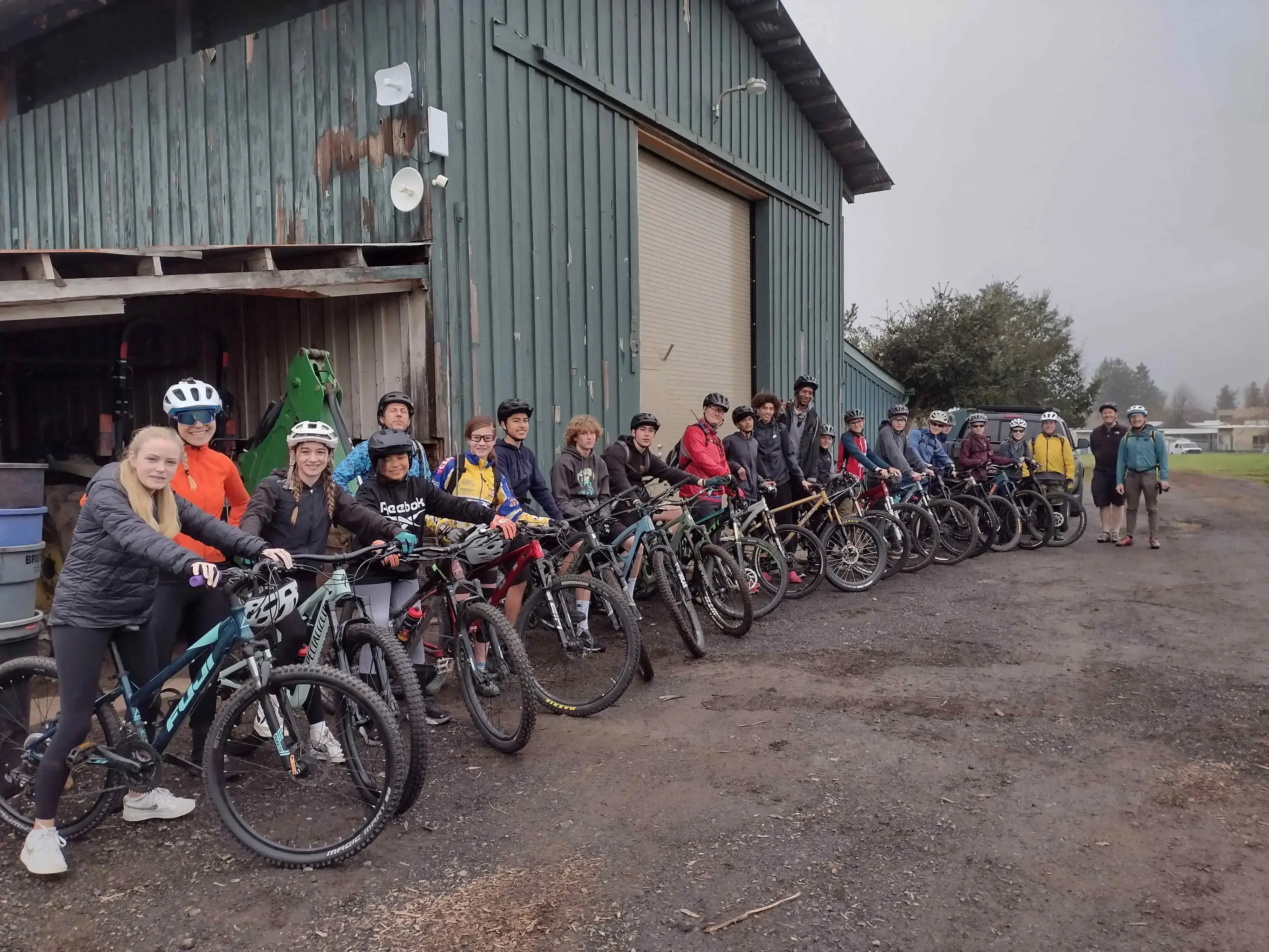 2022 Napa Valley Composite Cycling Team/ The Rebobs sit on mountain bikes.